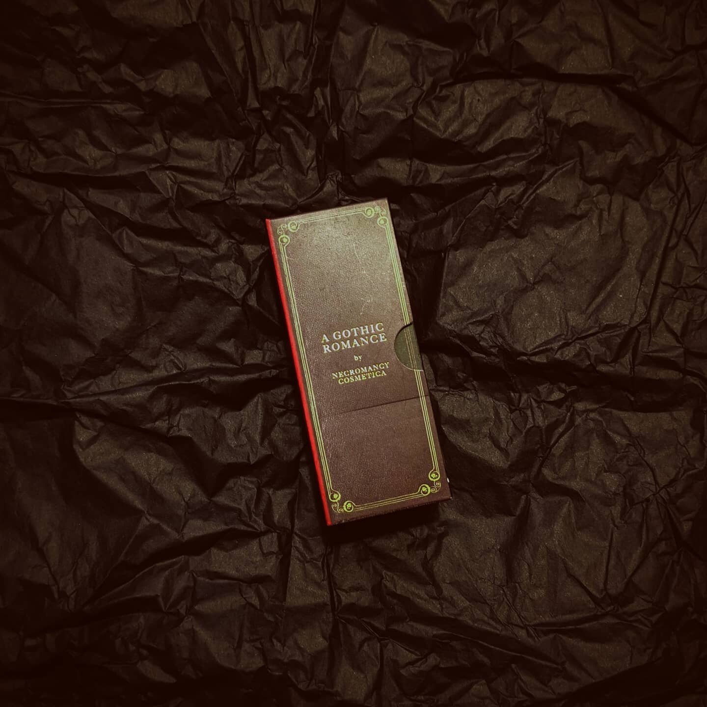 I am so excited about this beautiful palette from @necromancycosmetica 
It's beautiful, it looks like a book, it's about the sized of a lipstick box (it'll be so easy to travel with when travel exists again), I'm so over the moon, I can't wait to pla