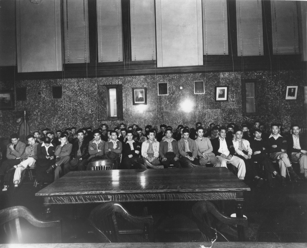 Kazuki’s brother, Kazuto, is in the front row, fourth from right. Original caption: The first day of the trial of the 63 Heart Mountain draft resisters in Federal District Court, Cheyenne, Wyoming on June 12, 1944. Photo: Courtesy of Frank Abe
