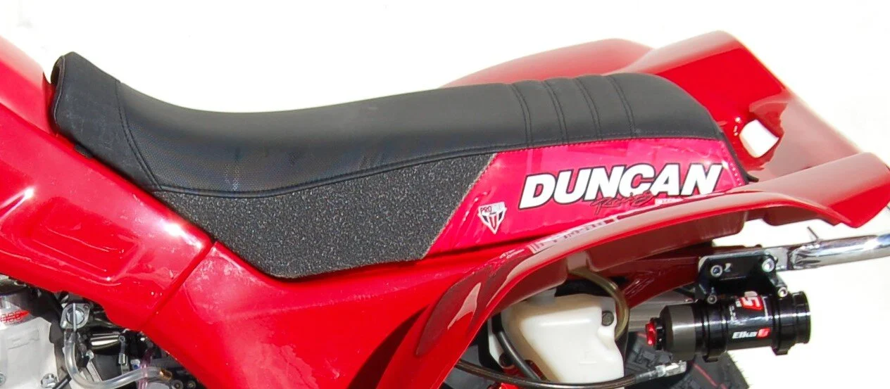 FMX Black & Orange Series Seat Cover for Yamaha Raptor 700