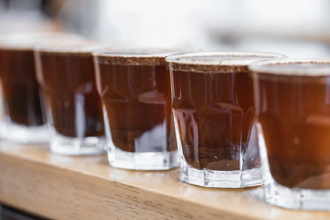 Five samples of one coffee prepared for cupping