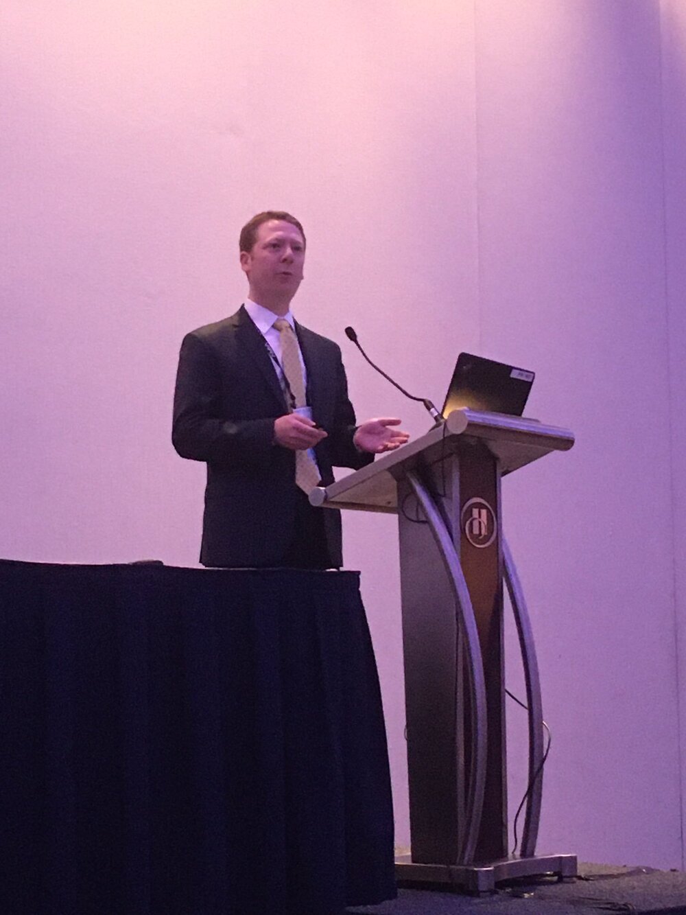 Aaron-Neinstein-Speaking-at-AMIA2019.jpeg