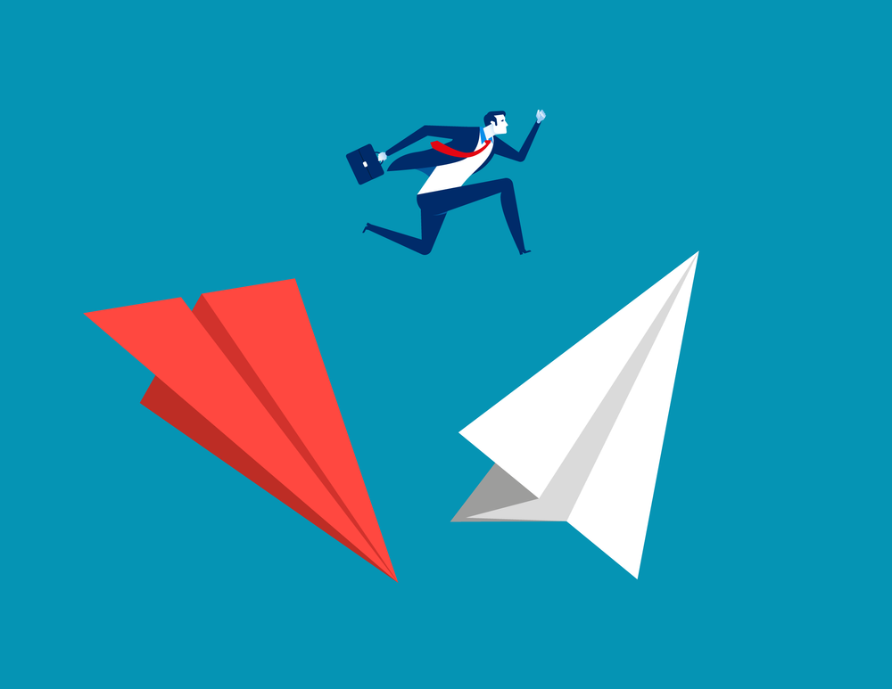 Man jumping from downward spiral paper plane to an upward pointing paper plane