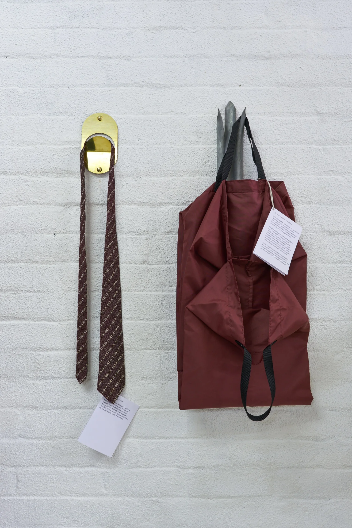 Timothy Tuppence, To Hang One’s Hat: Home , 2019. Brass. and T o Hang One’s Hat: Non Home, 2019. Aluminium.