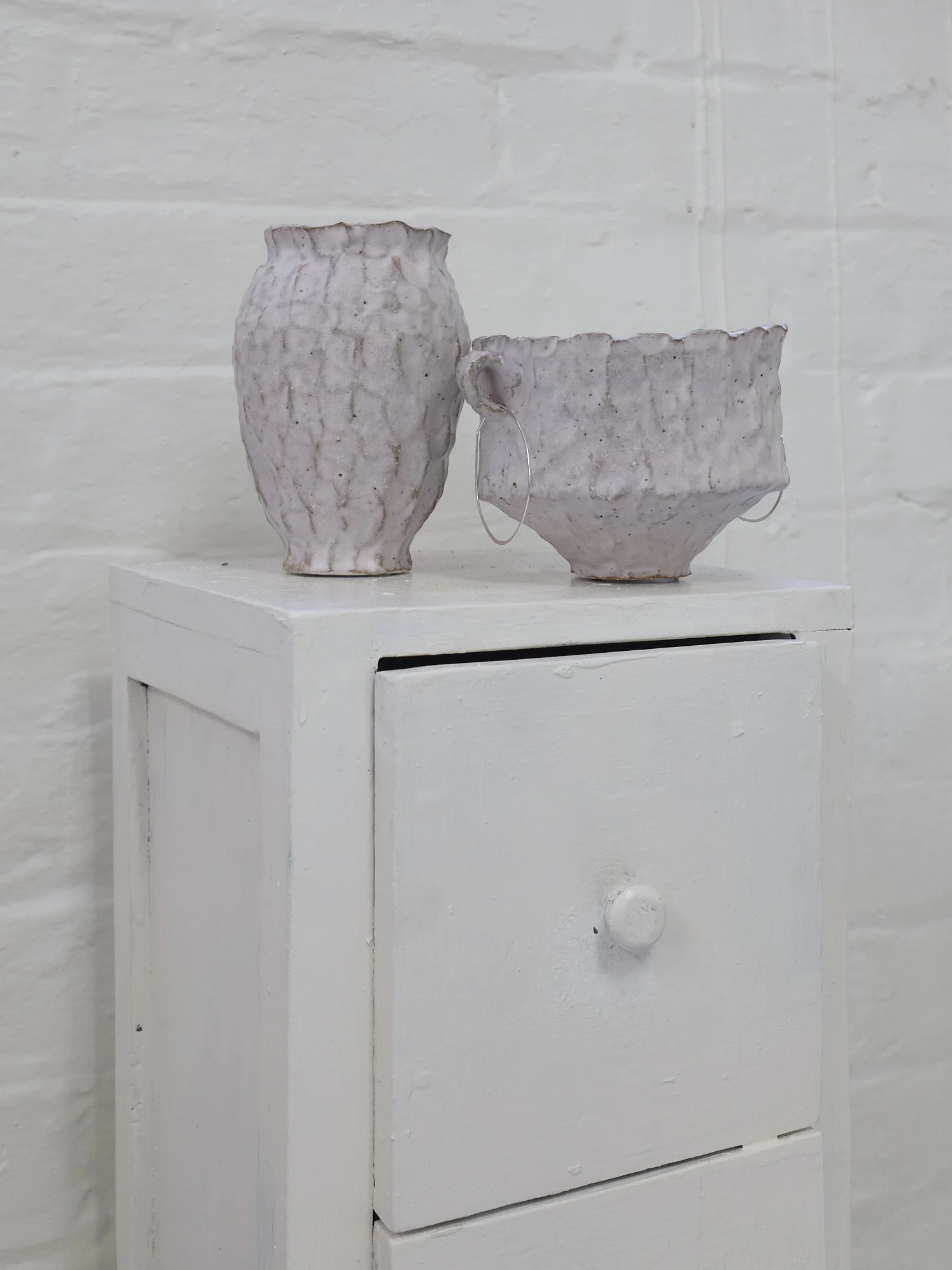 Connie Augoustinos, Handled vessel and Vessel 2019. Stoneware, matte glaze.