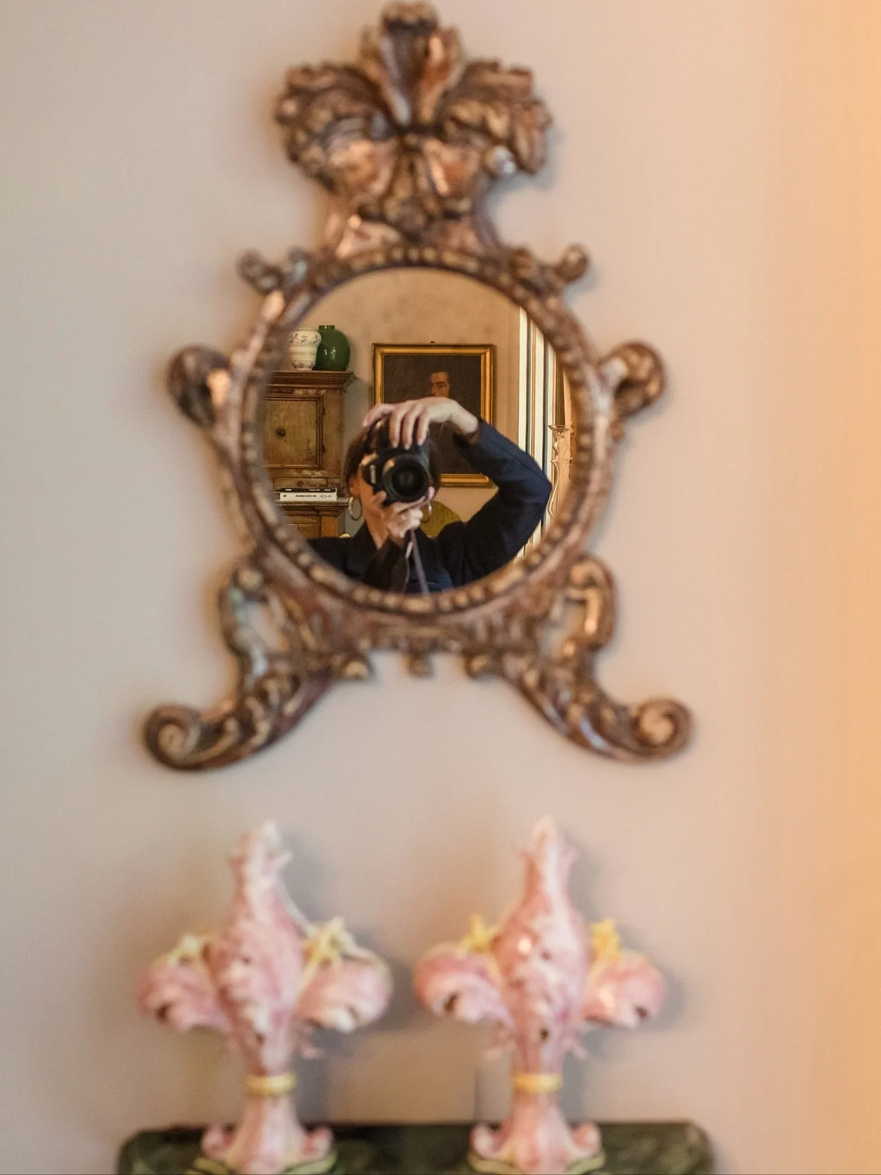 ~
The Mirror Portrait

At every wedding, there&rsquo;s a moment that belongs only to me.
It happens quietly, somewhere between laughter and tears, when I find a mirror and see my reflection looking back.
I raise my camera, and for a second, the story