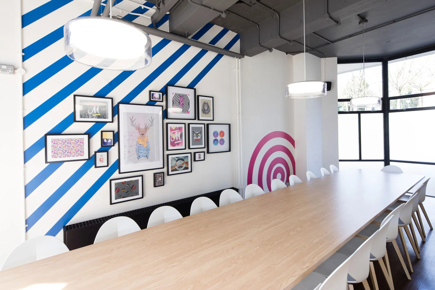 Frames and artwork on feature wall