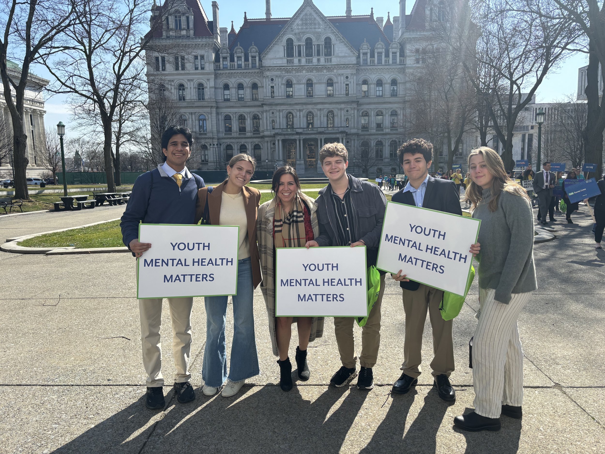 Kids with state house.jpg