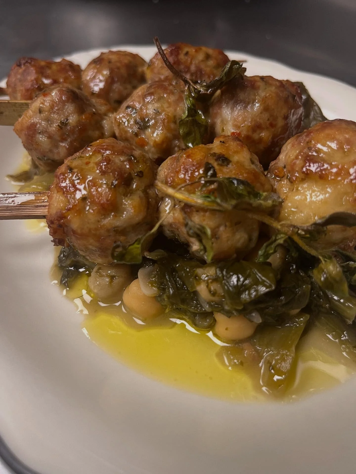 Meatball spiedini, braised in beer and parm rinds and then roasted. Perfect to accompany basically anything&hellip;..
.
.
.
#meatballs #escarole #eacarole