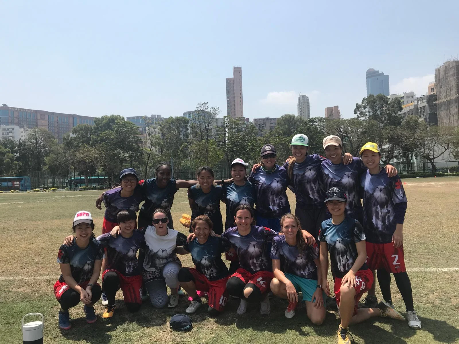 Me, on the right in the yellow cap with my women’s ultimate frisbee team, Black Kites