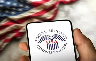 person holding phone with social security app