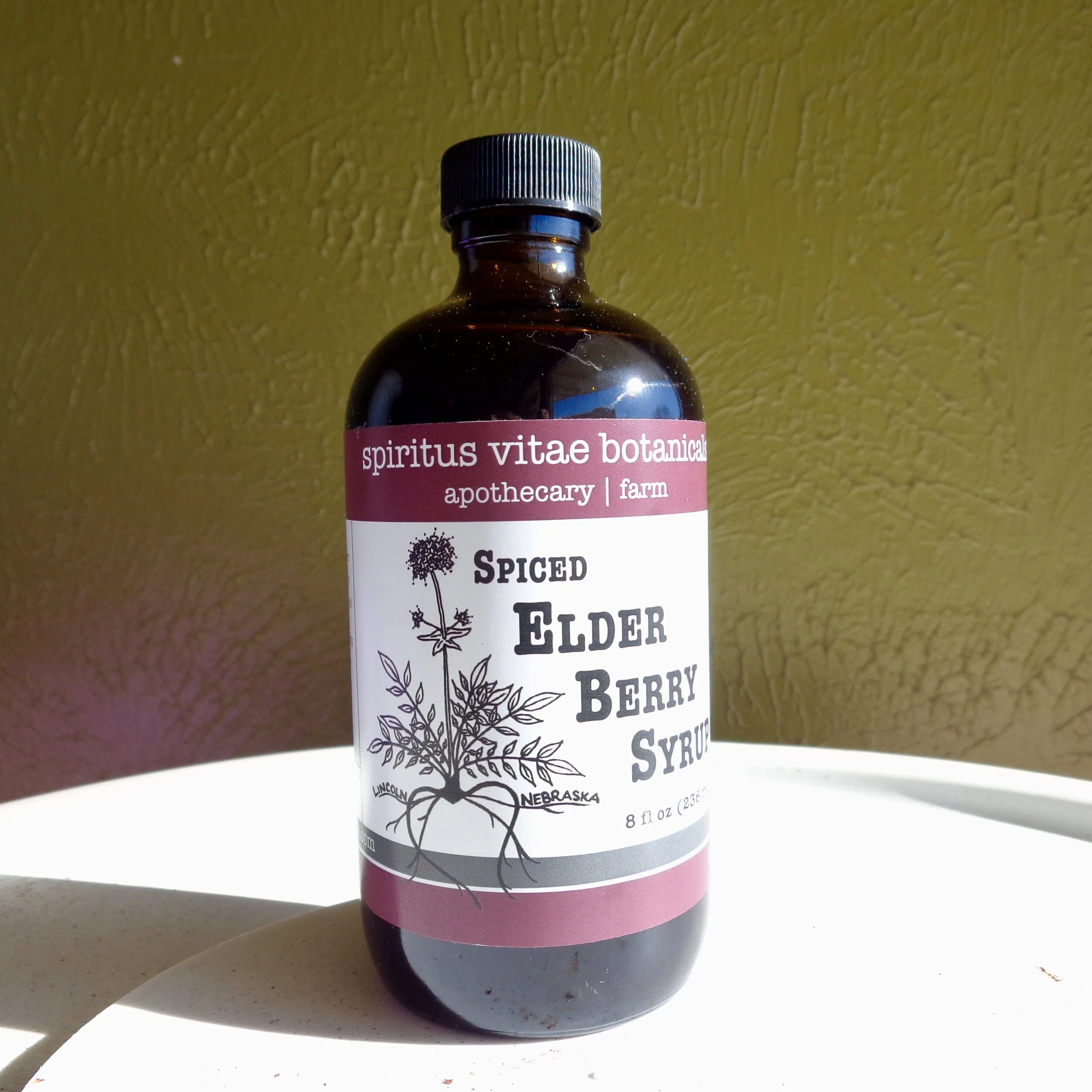 Bottle of Spiced Elder Berry Syrup from Spiritus Vitae.