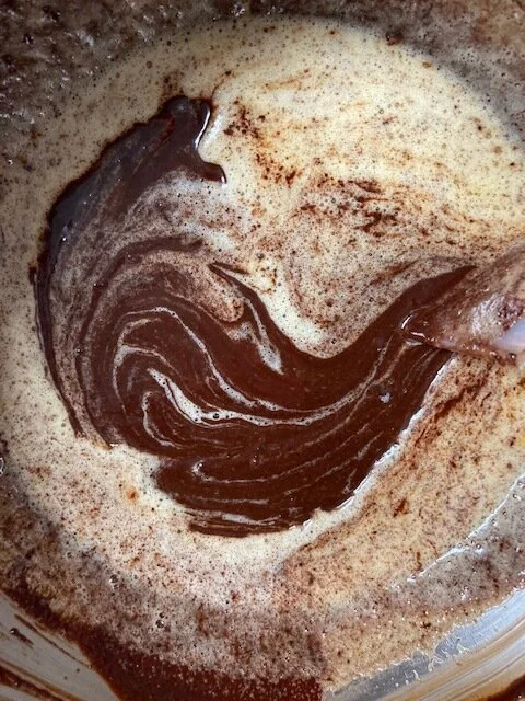 5. Now you want to mix it. Don’t go too wild here. You want a gentle but firm hand. If you’ve ever made ganache before, you know you’re supposed to start mixing in the middle until the mixtures come together. It’s the same here. I usually use a spat…