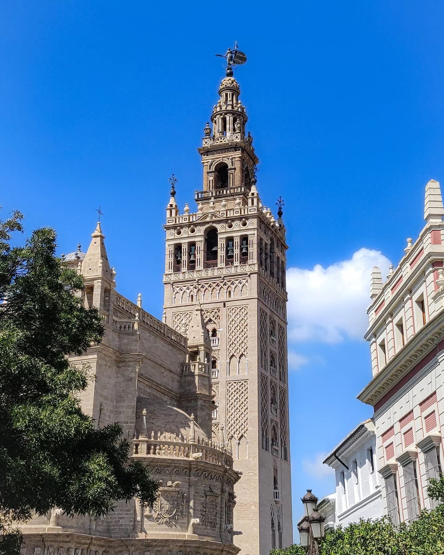 The Giralda Tower, formerly a minaret, is a unique and impressive structure located in the heart of Seville, Spain. The tower dates back to the 12th century and was built as part of the Grand Mosque during the Moorish rule of Spain. After the city wa