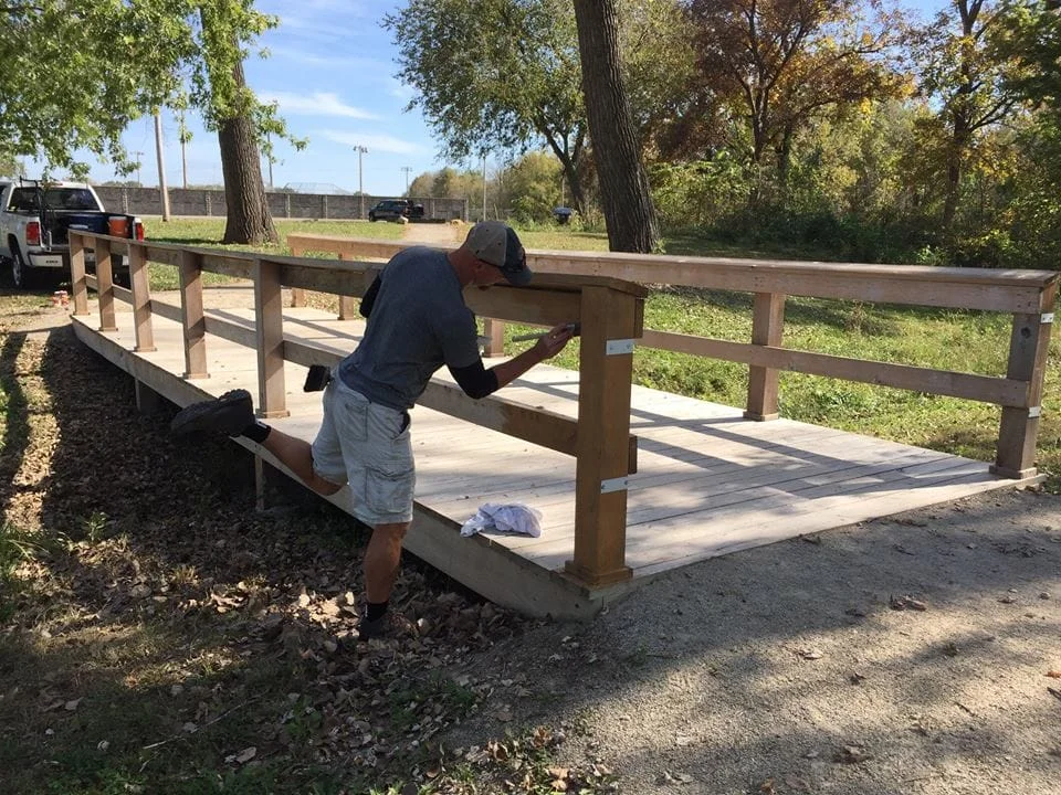 October 2016 - Task force volunteers stain bridge