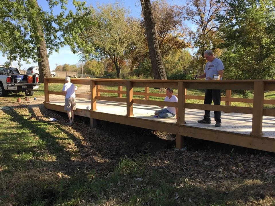 October 2016 - Task force volunteers stain bridge