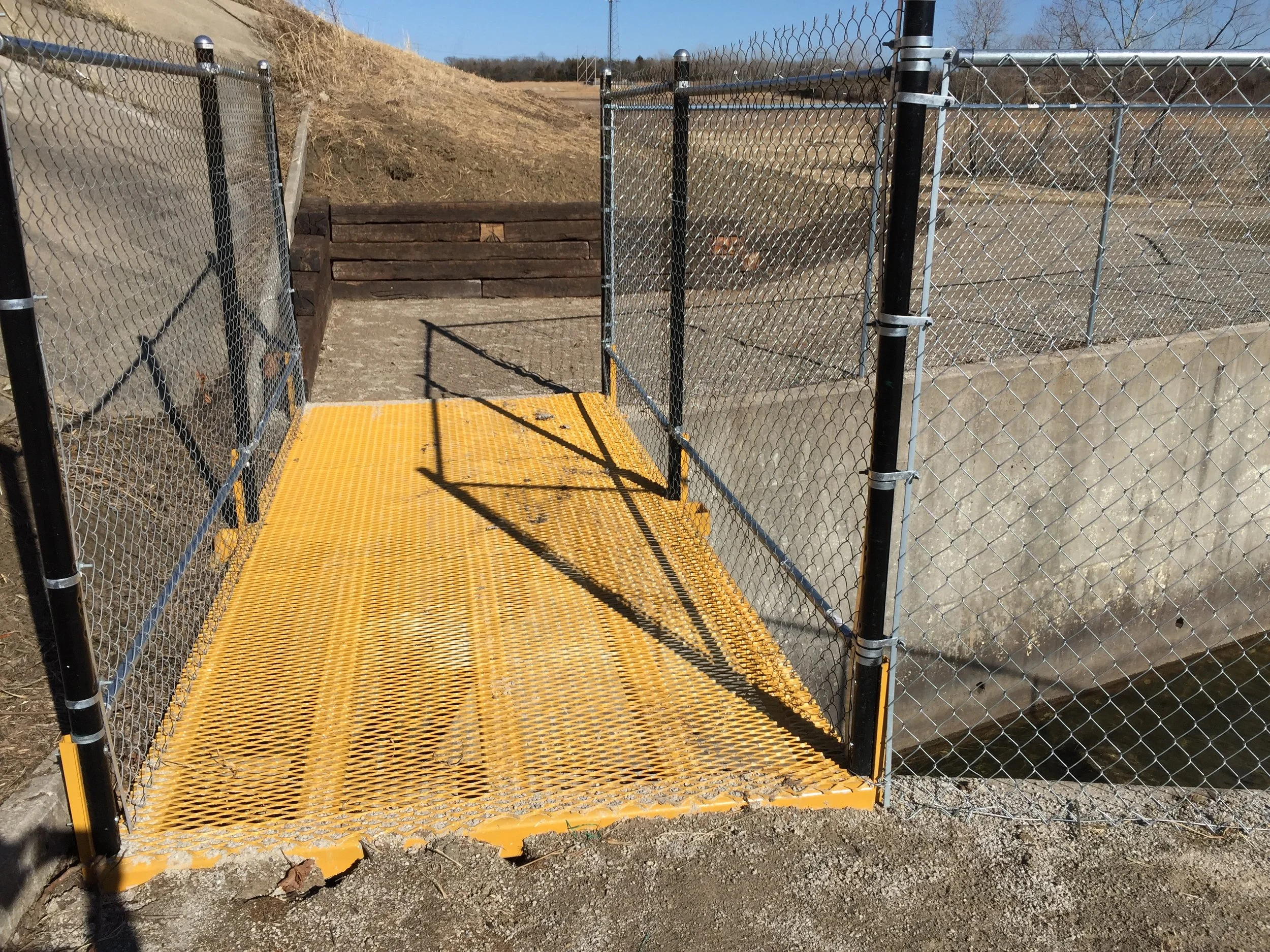 Spring 2018-steel bridge safely crossing spillway