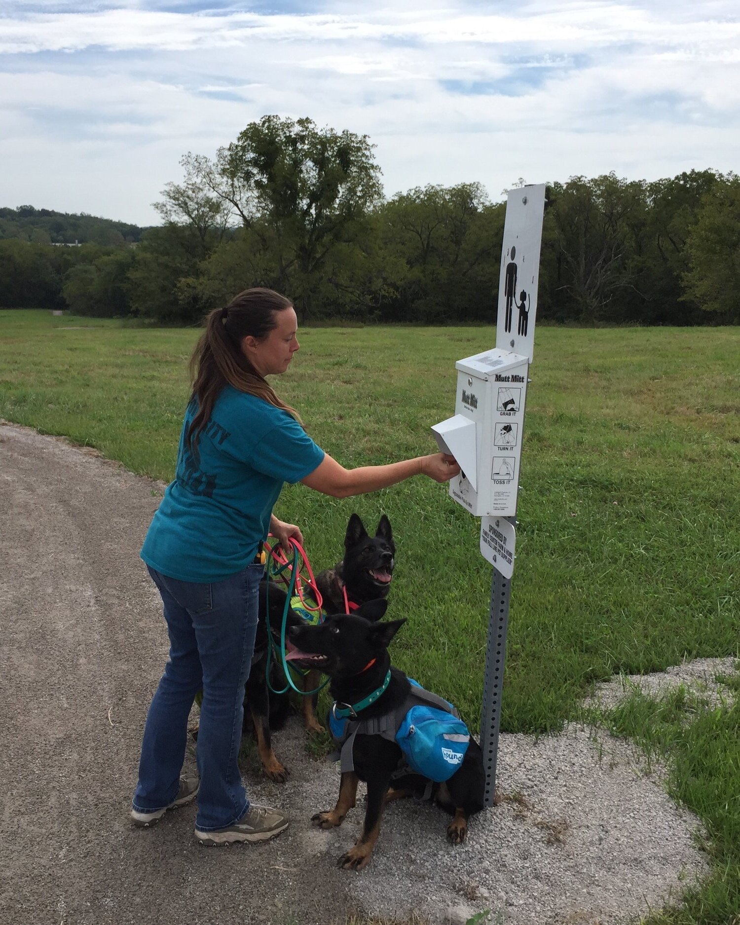 Conscientious dog owner prepares for a walk