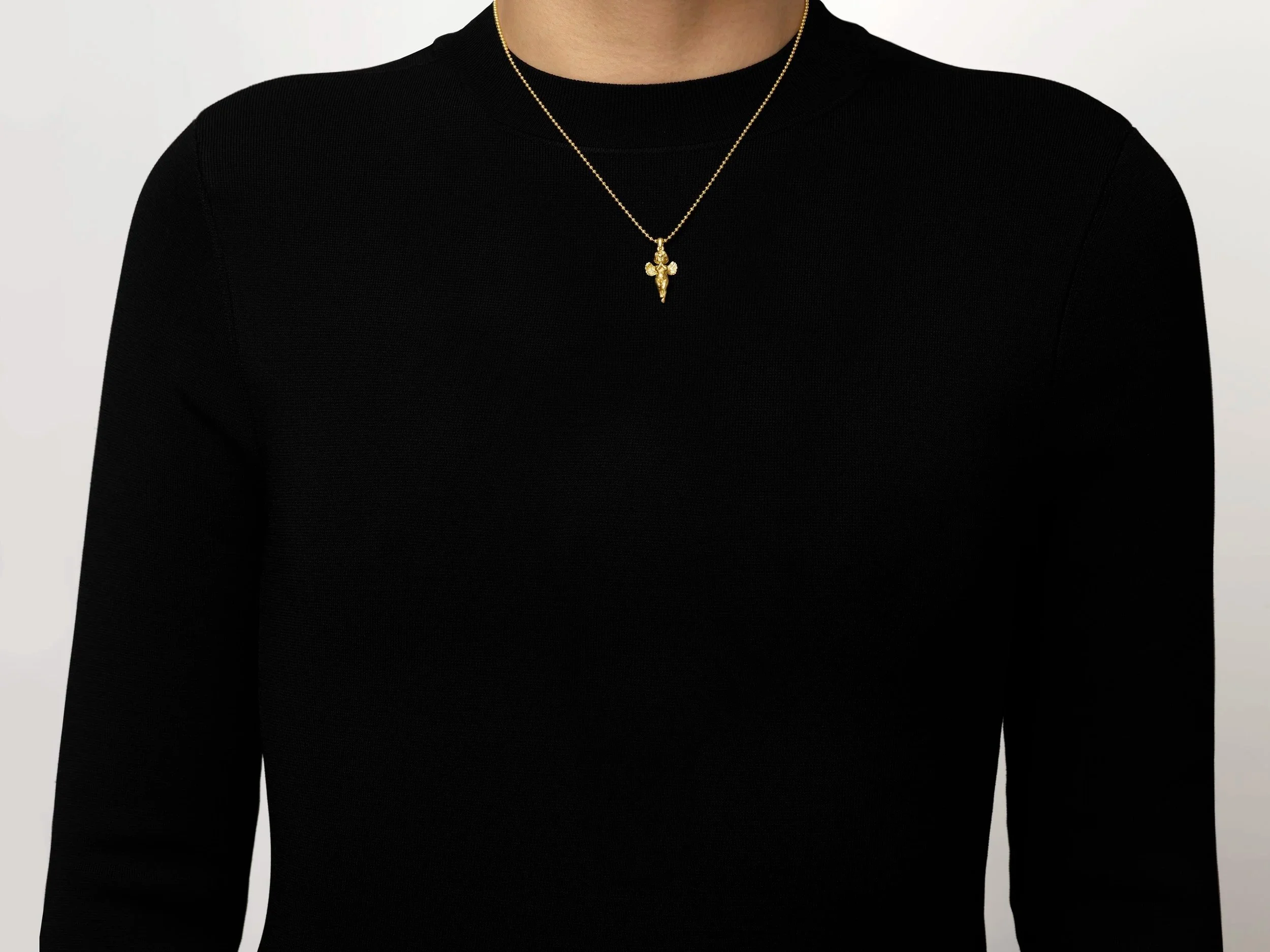 18K gold Mini Messenger necklace by NAONES  featuring a sculptural messenger figure pendant on a 16-inch adjustable ball chain