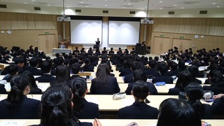 Shunzo plays trumpet at a seminar for students in Northern Japan.