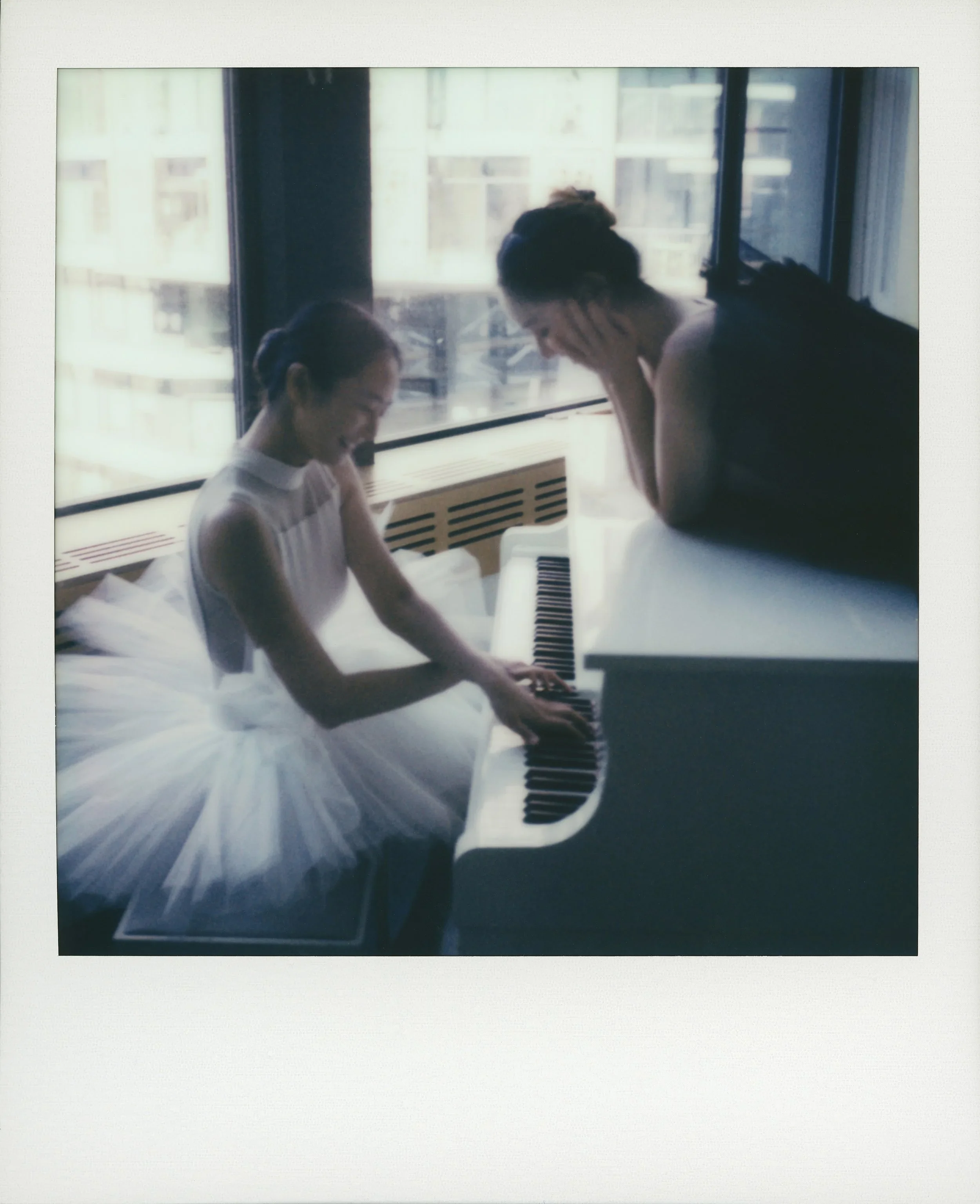 Two+Dancers+and+a+Piano_Polaroid_01_template_low-res.webp