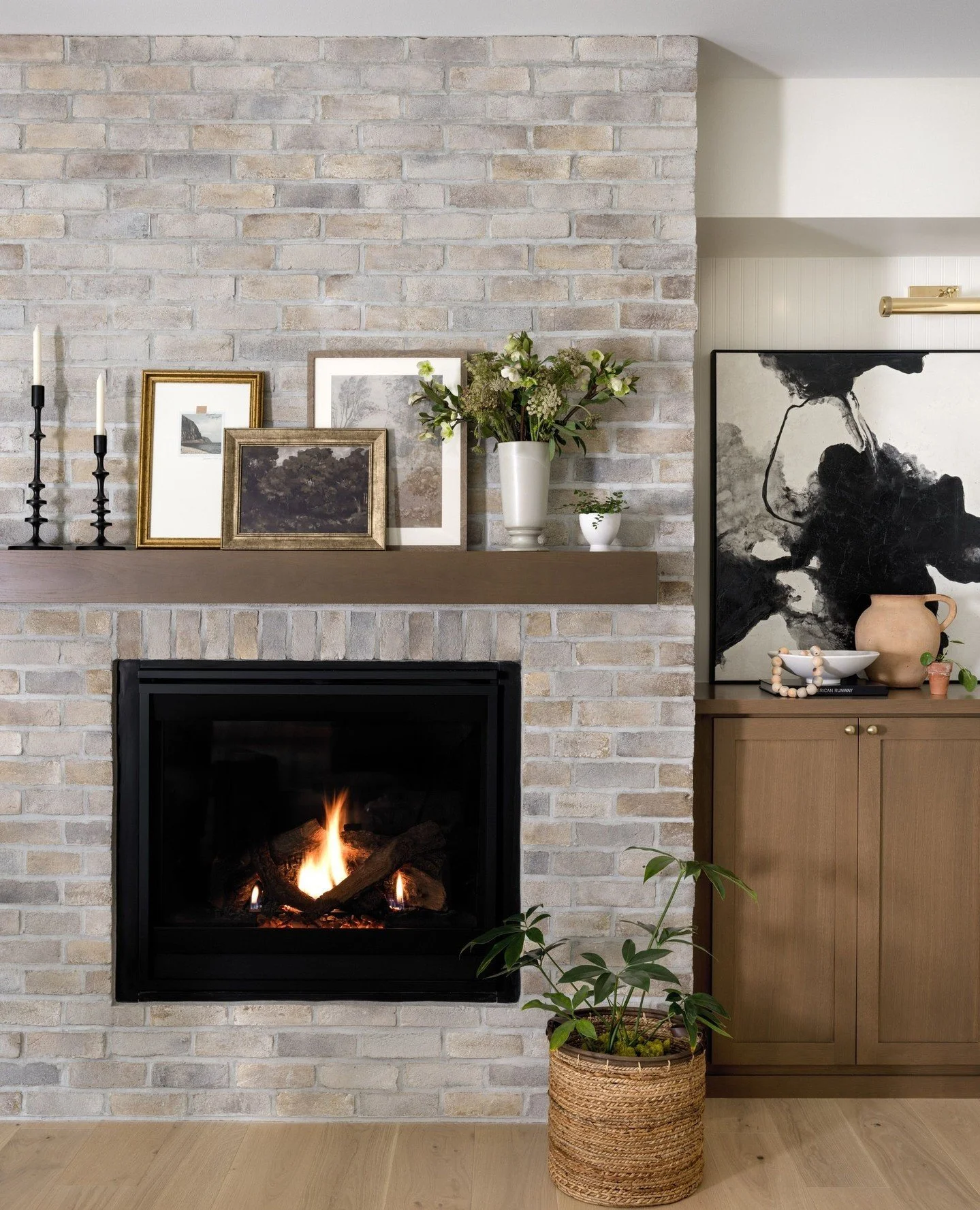 Getting cozy this Fall! A full style for the custom fireplace in our Maple Valley Project. ⁠
⁠
Interior Design | @aminterior_design⁠
Photography | @mirandaestes⁠
Builder | @3phaseconstructionwa⁠
⁠
.⁠
.⁠
.⁠
⁠
#AMIDMapleValleyProject #seattleinteriorde