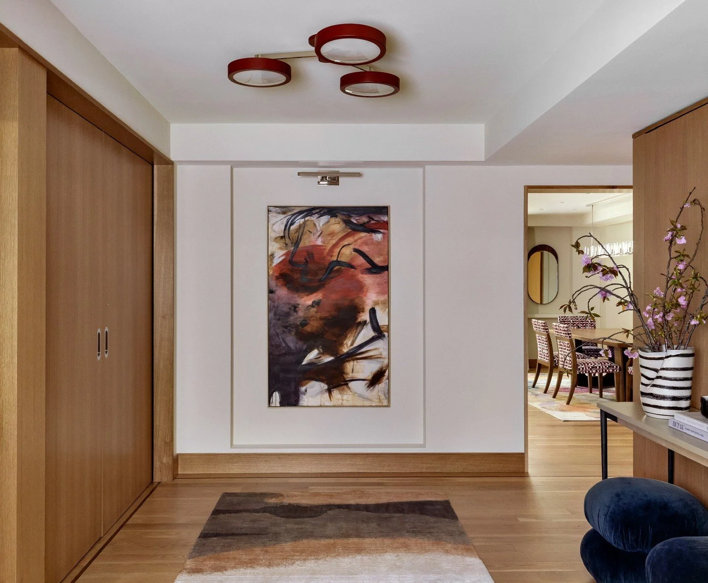 The foyer in our ⁠Upper Eastside Manhattan Project was designed to make a good first impression!  Balancing the abstract pieces with rich, solid accent colors gives the room a little something extra. ⁠
⁠
⁠
Interior Design | @aminterior_design⁠
Photog