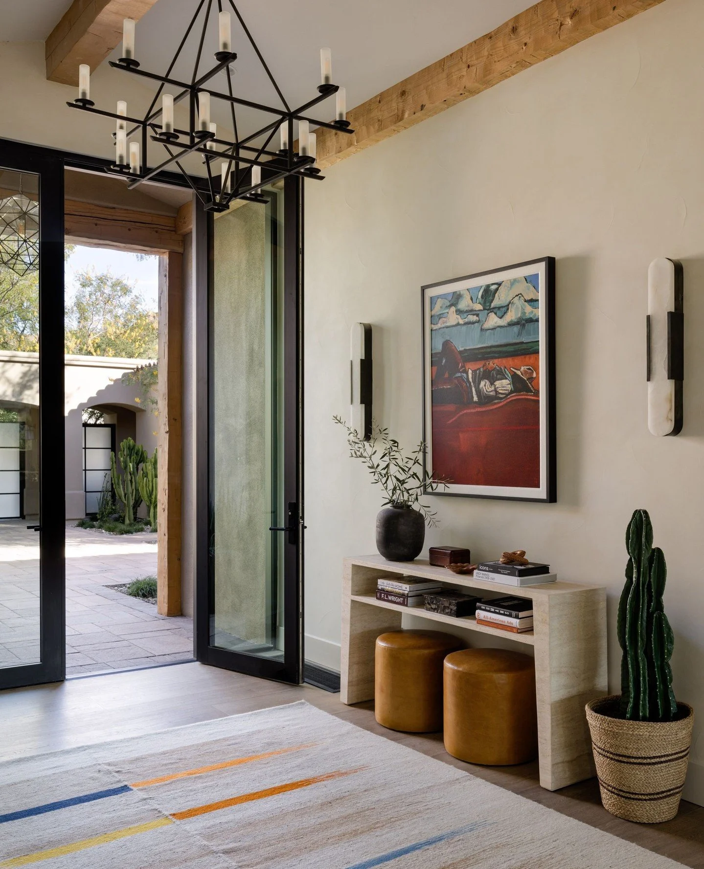 Entering from the expansive atrium at Desert Hacienda, you are met with the inviting foyer. The color palette we chose was in consideration for the desert scene. ⁠
⁠
Interior Design | @aminterior_design⁠
Photography | @mirandaestes⁠
⁠
⁠
.⁠
.⁠
.⁠
⁠
#A
