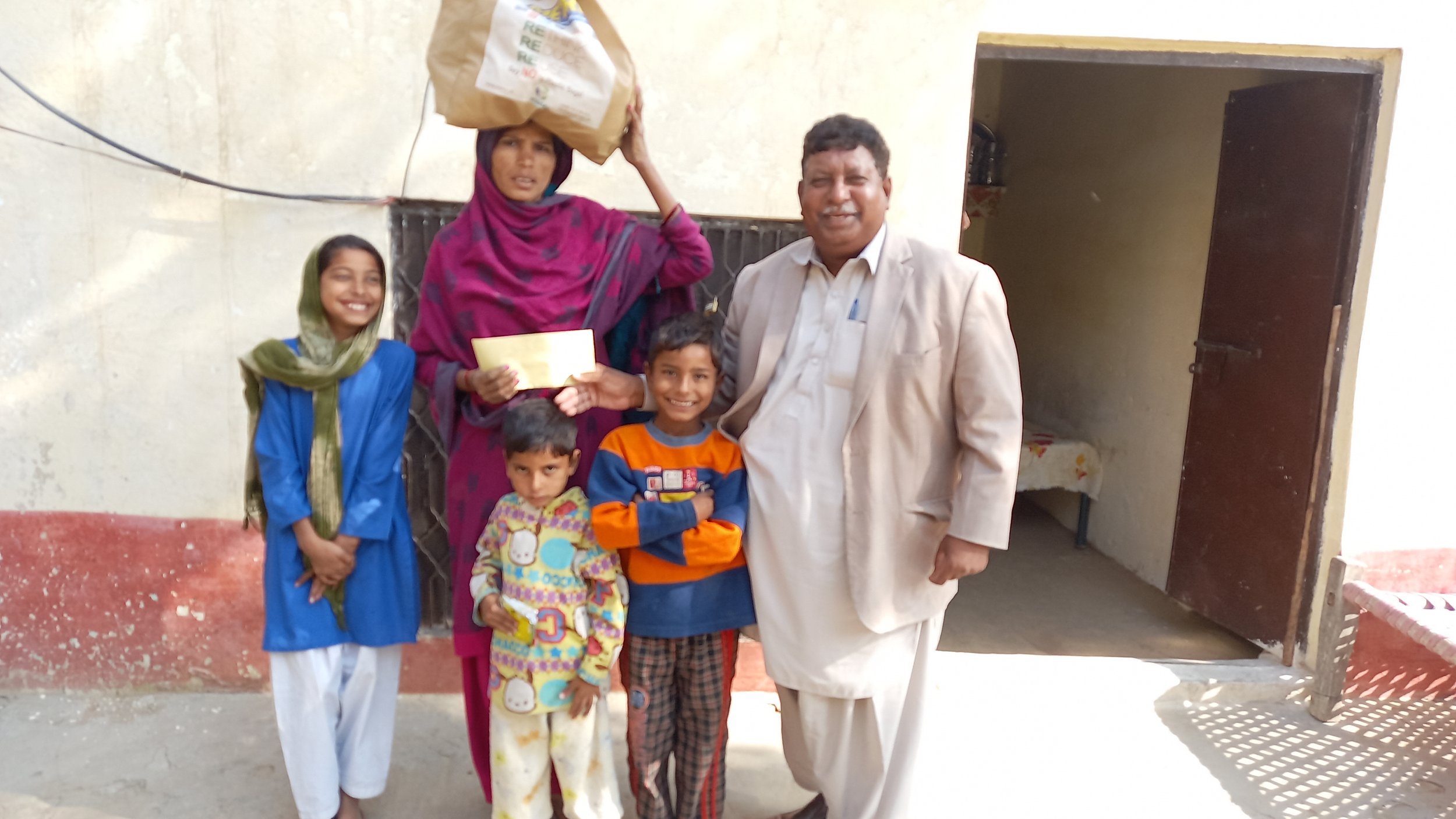 Sobia and her three children receive support in November with great gratitude.