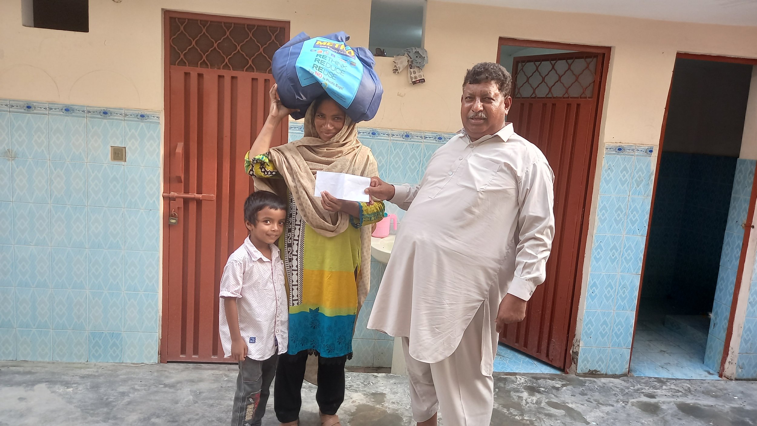 Widow Shakeela received food bag &amp; support happily from Pastor Saleem Raza 