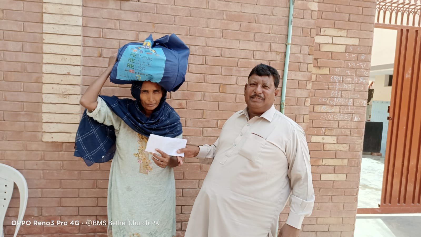  Widow Nusrat receives aid and is thankful for the support. 