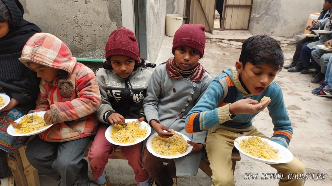 Children taking lunch in Bible Camp