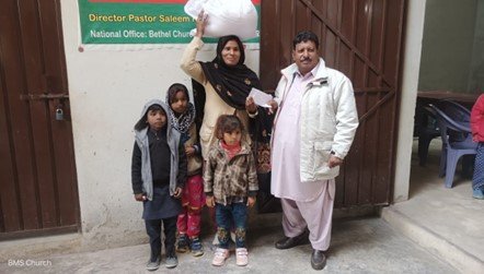 Nadia receives food bag &amp; support from Pastor Saleem Raza