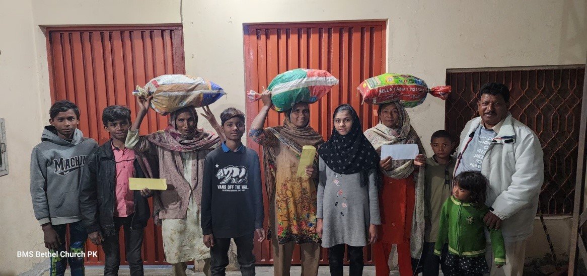 Group of widows at Raiwind receive food bags &amp; support.