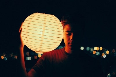 man holding lantern-min-min.jpg