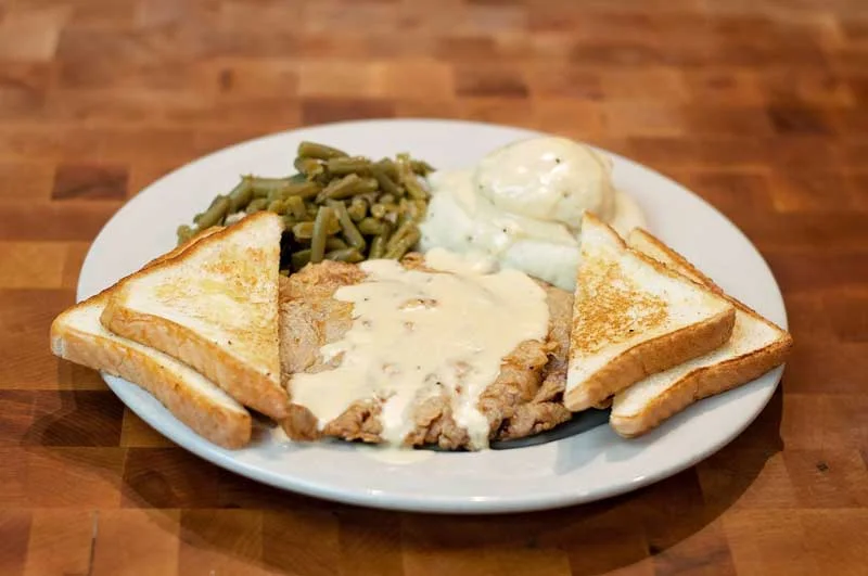 BBQ DINNERS Brisket, Sausage, Turkey, Pork Ribs, Chicken, Pulled Pork. All dinners are served with two sides. Substitute okra for .50¢ Lonestar .5lb (one meat) $12.50 Ranch Hand .35lb/.35lb (two meats) $15.50 Tin Roof .30lb/.30lb/.30lb (three meats) $18.50 Half Chicken Plate $13.50 Grilled Chicken Plate $11.50