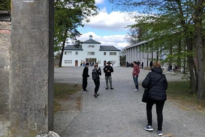 Visitors entering Tower A at Sachsenhausen Concentration Camp during a guided tour from Berlin