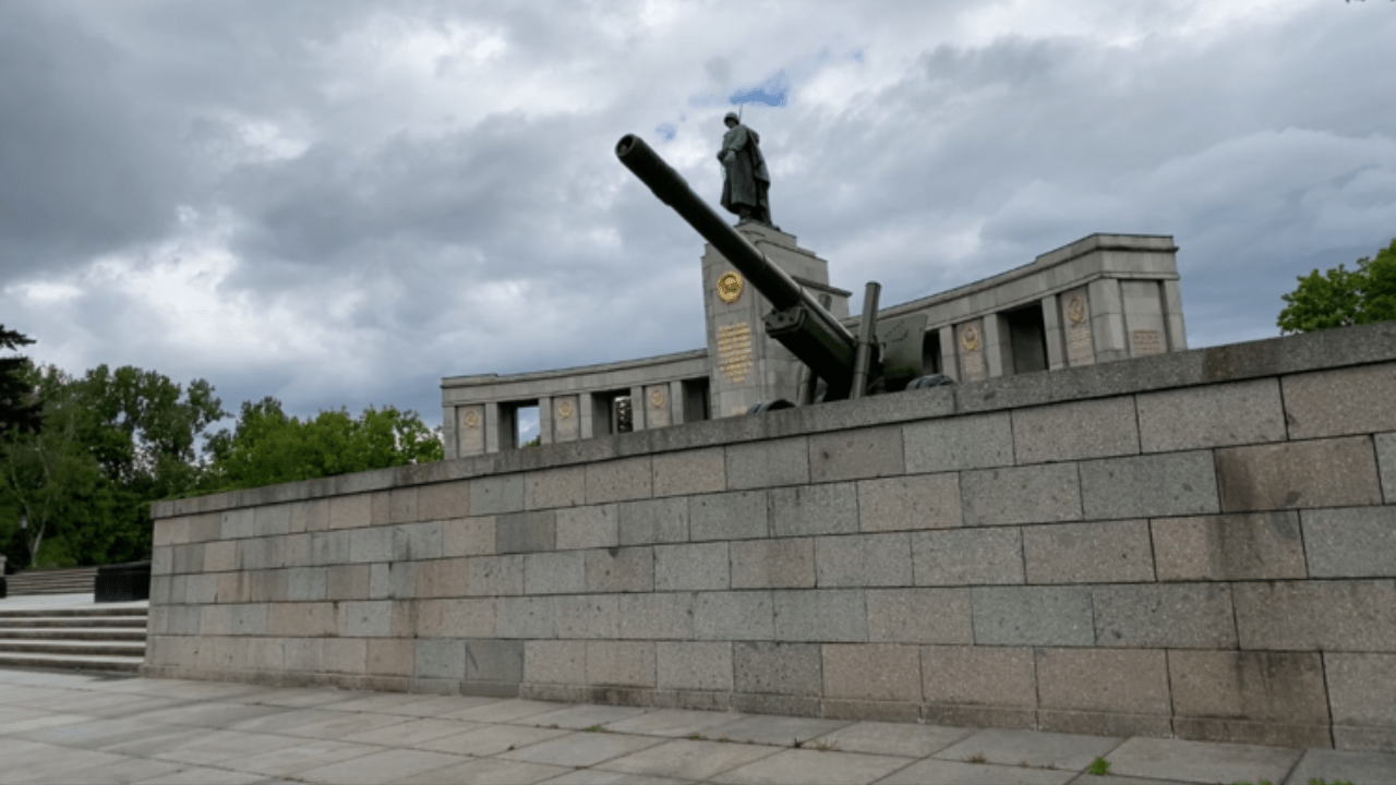 The colonnade and bronze soldier of the Soviet War Memorial in the Tiergarten, Berlin.