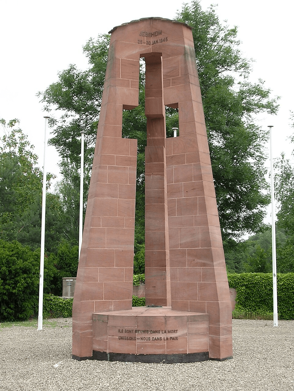 Inter-Allied Memorial at Jebsheim — red sandstone cross inscribed 'Jebsheim 25–30 Jan 1945', a Colmar Pocket battlefield site.