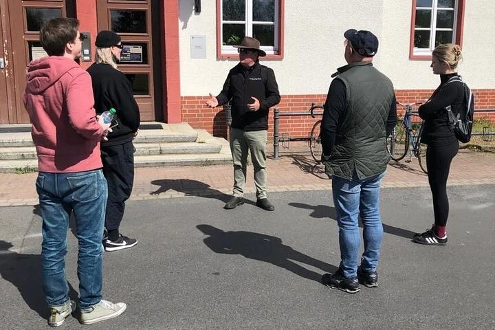 StolpersWWII historian introducing guests to the former SS Inspectorate during a Sachsenhausen tourteine
