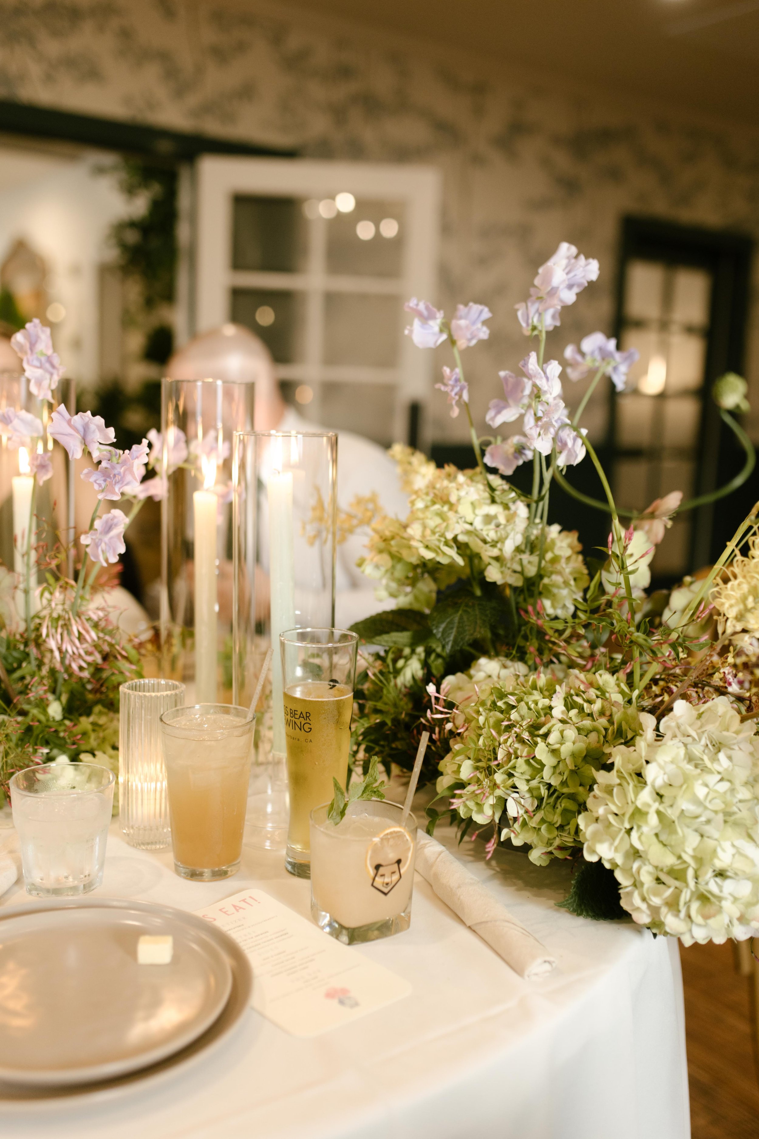 Signature cocktails, candlelight, and wild florals—reception magic after a wedding Santa Barbara Courthouse.
