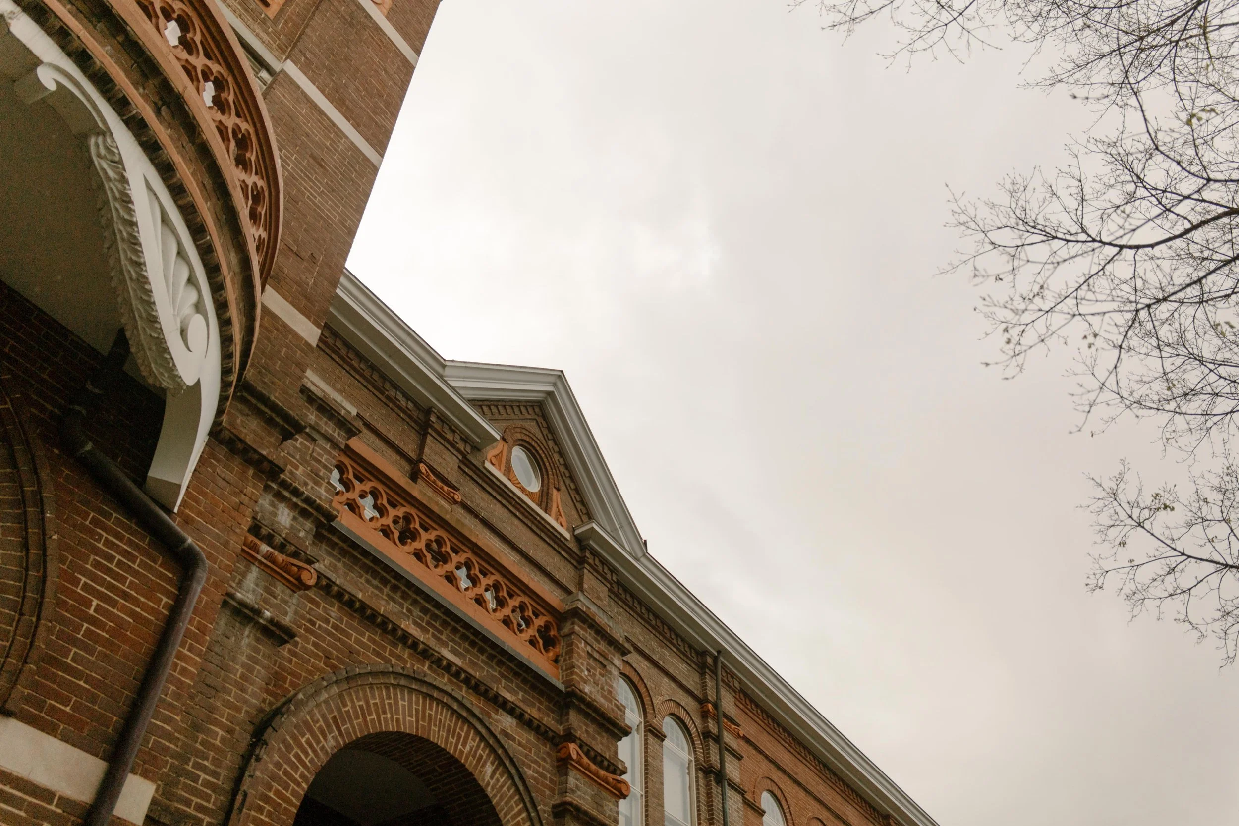 A moody sky above the ornate architecture of the Knoxville courthouse—an iconic setting for their elopement.
