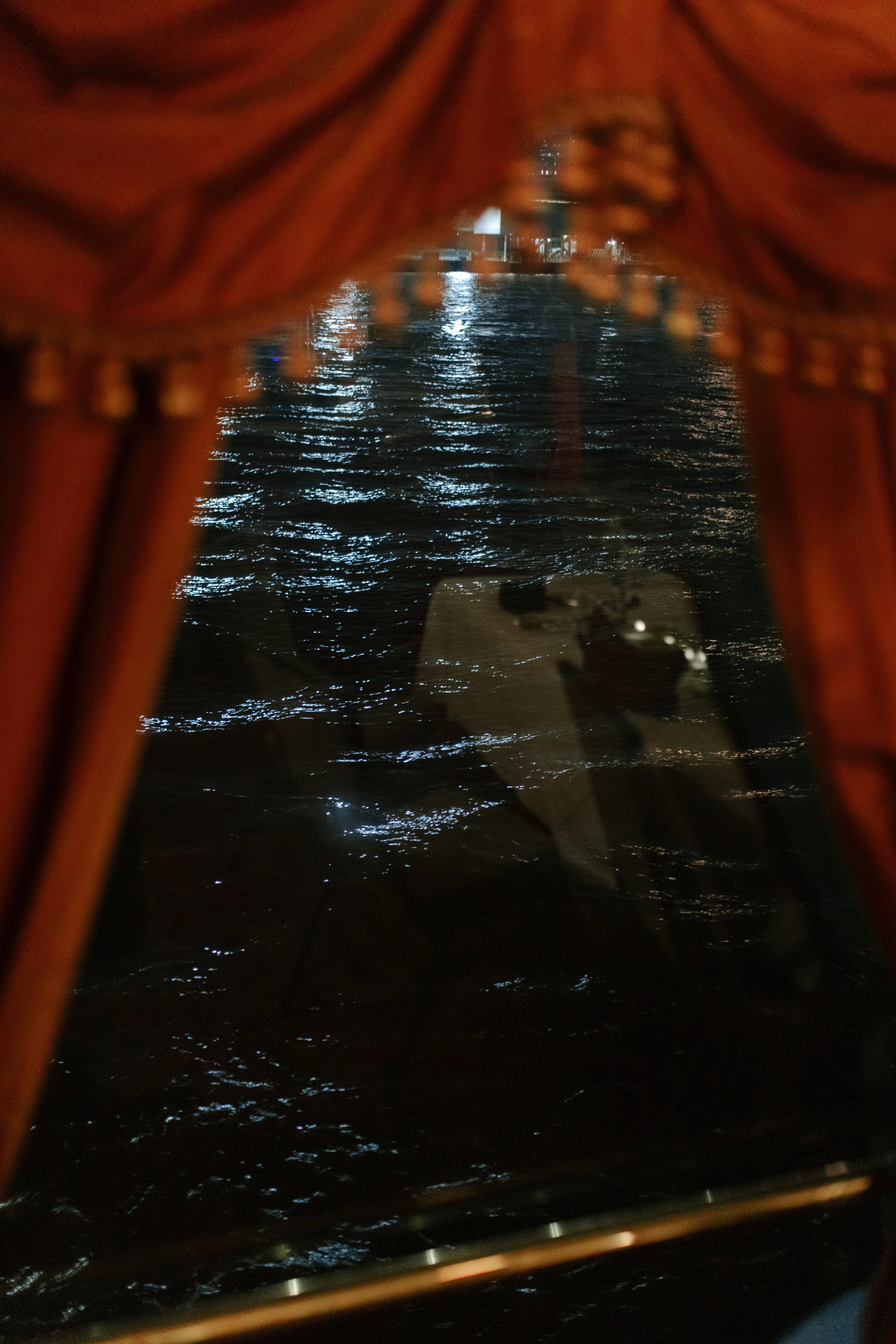 View from a window within the boat on their New Orleans wedding rehearsal dinner. 