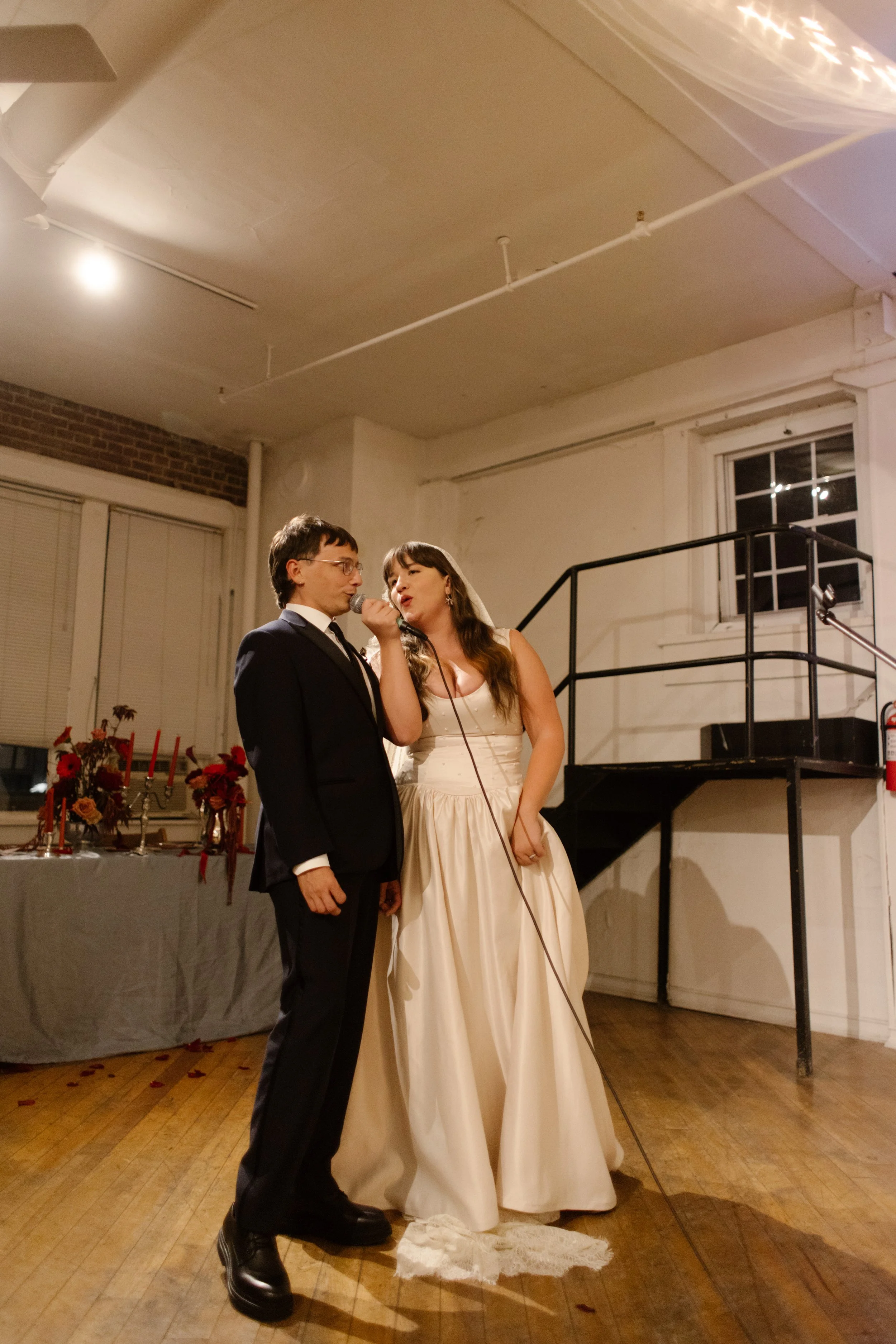 Wedding couple stand together thanking their guests during Tennessee wedding reception