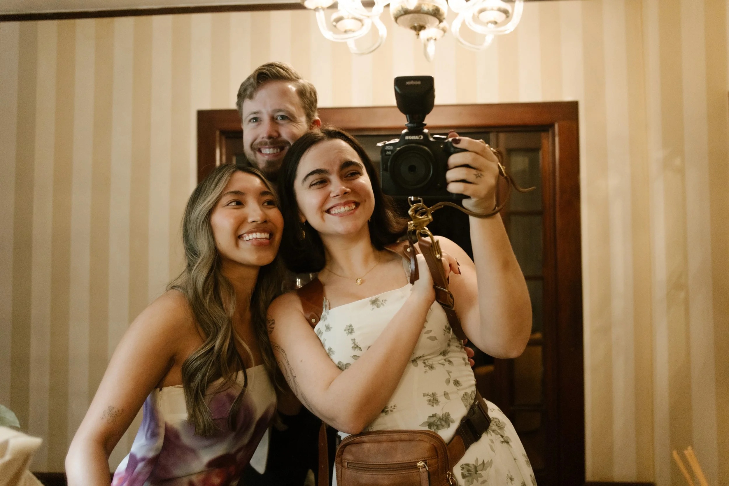 Guests gathered outside under string lights during a warm evening wedding in Santa Barbara