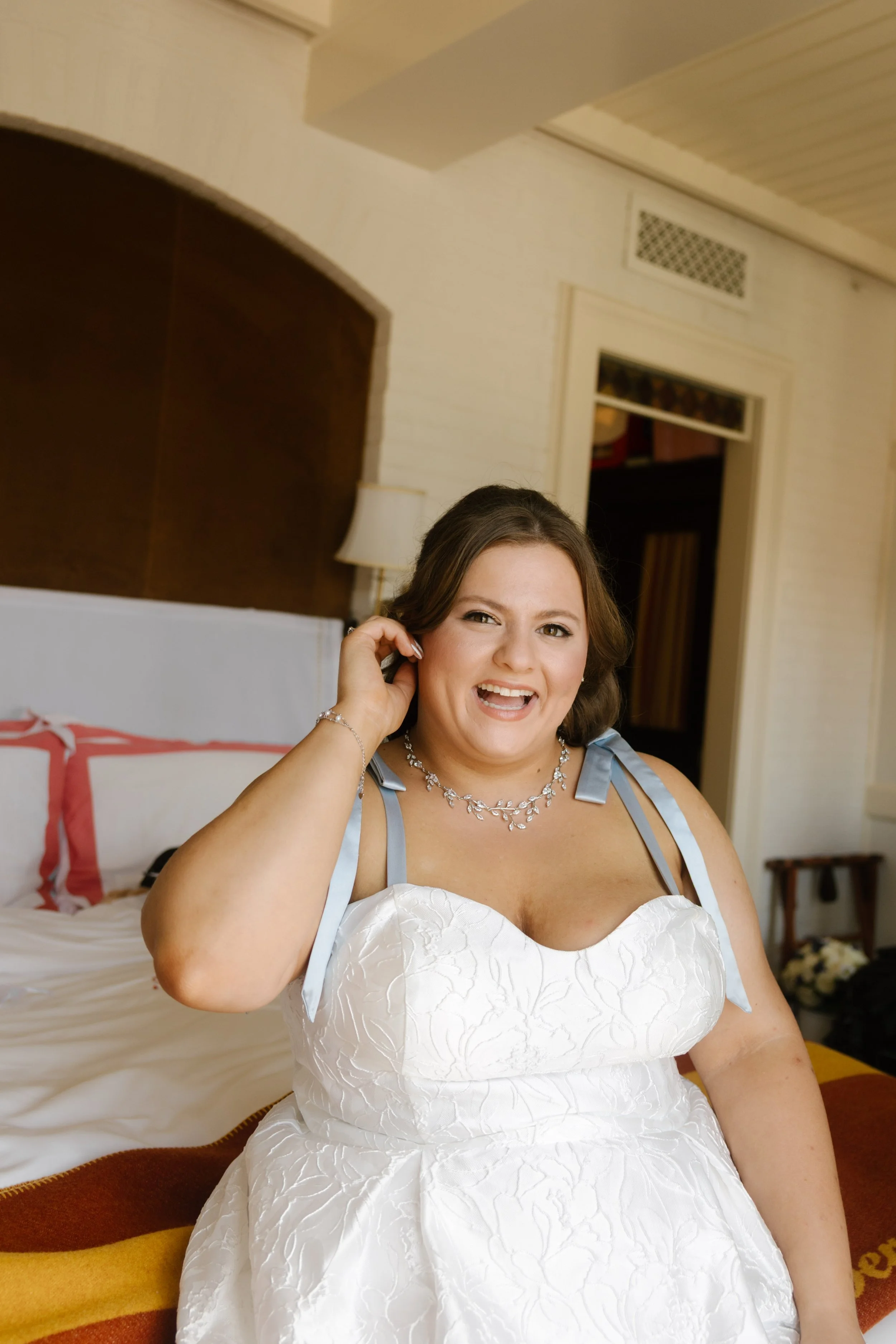Bride getting ready inside elegant hotel suite before intimate New York Wedding ceremony