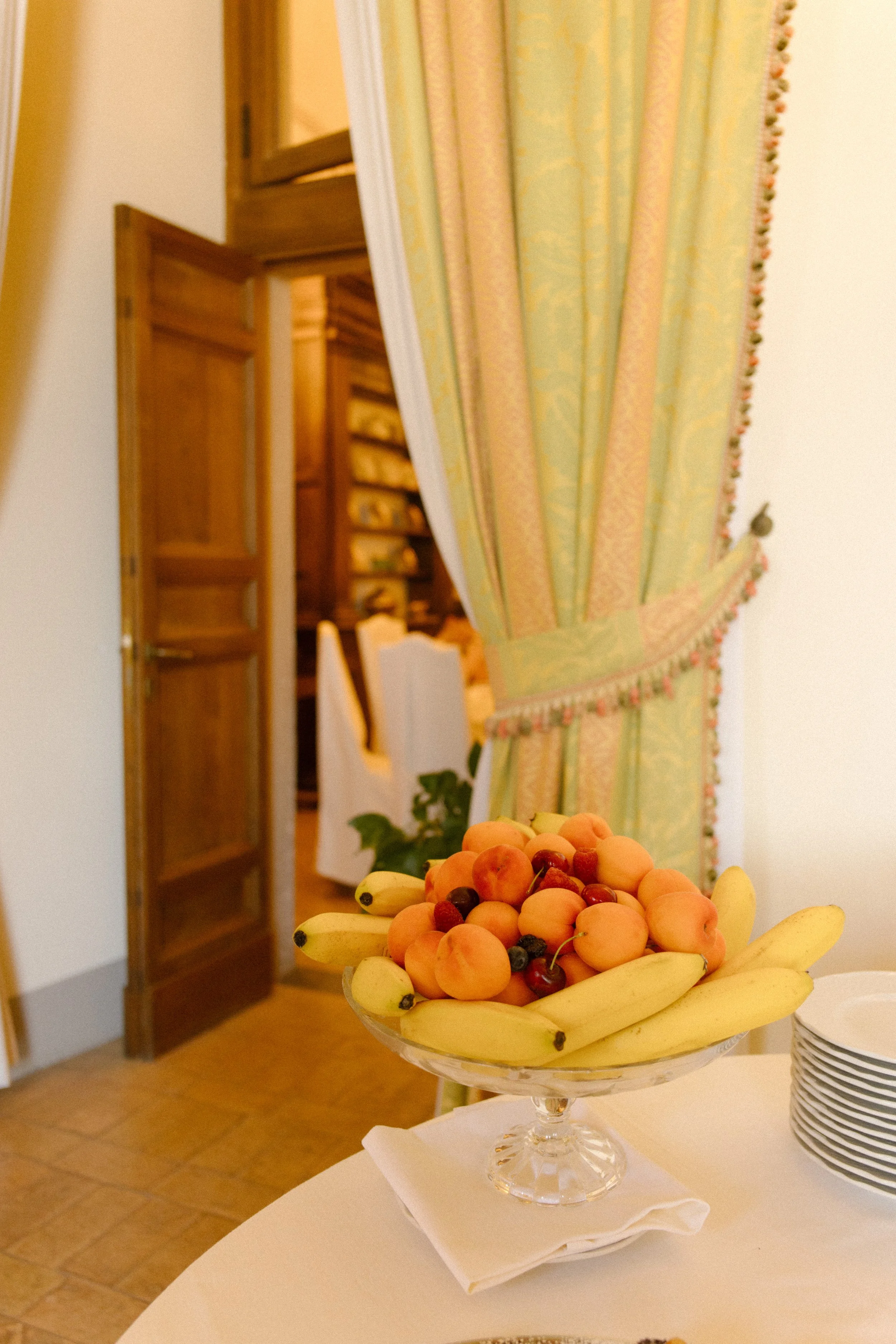 Fresh fruit displayed inside a historic villa during a destination wedding in Italy farewell brunch