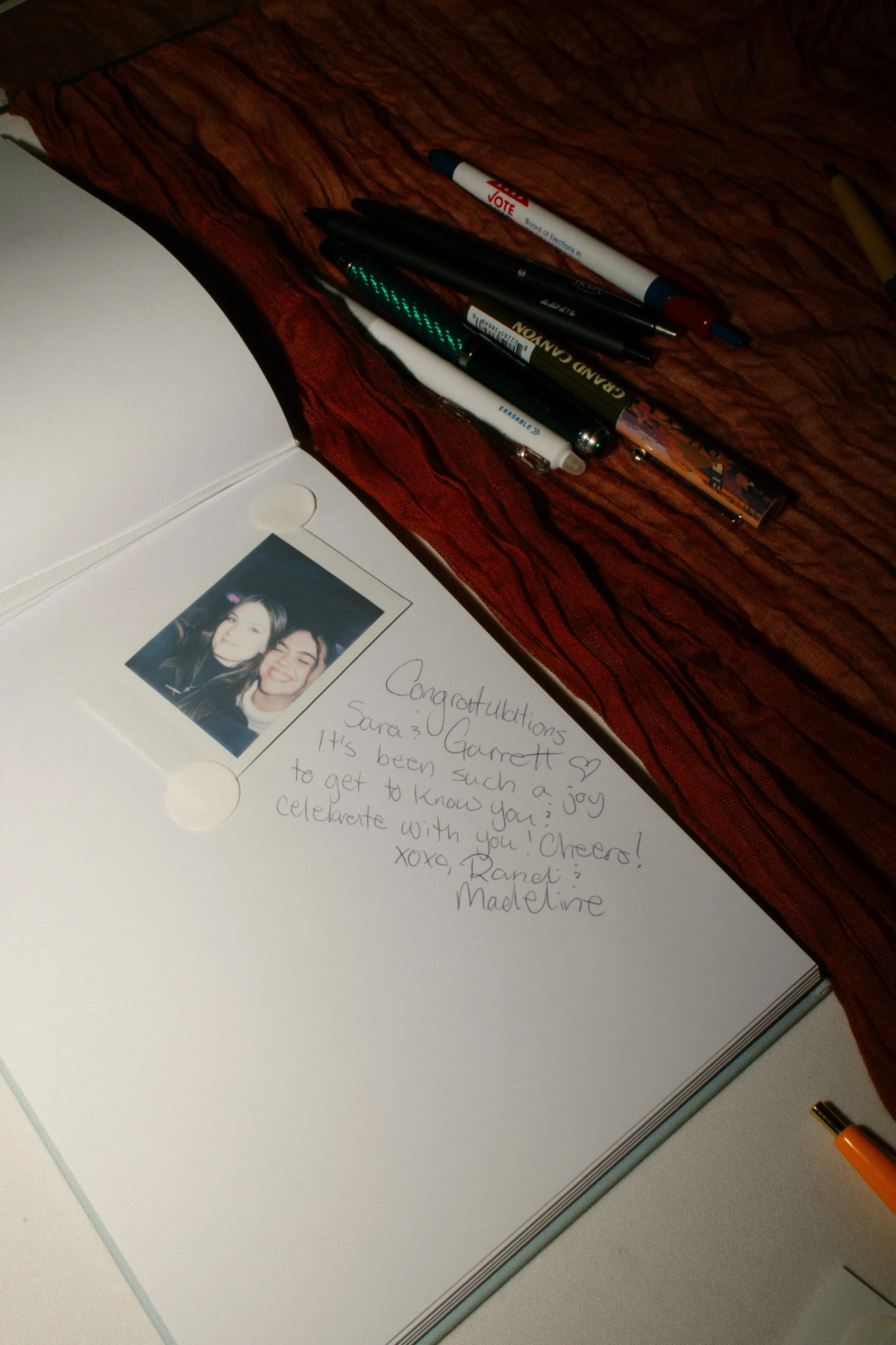 Wedding guest book with handwritten message and instant photo from guests at a wedding in New York