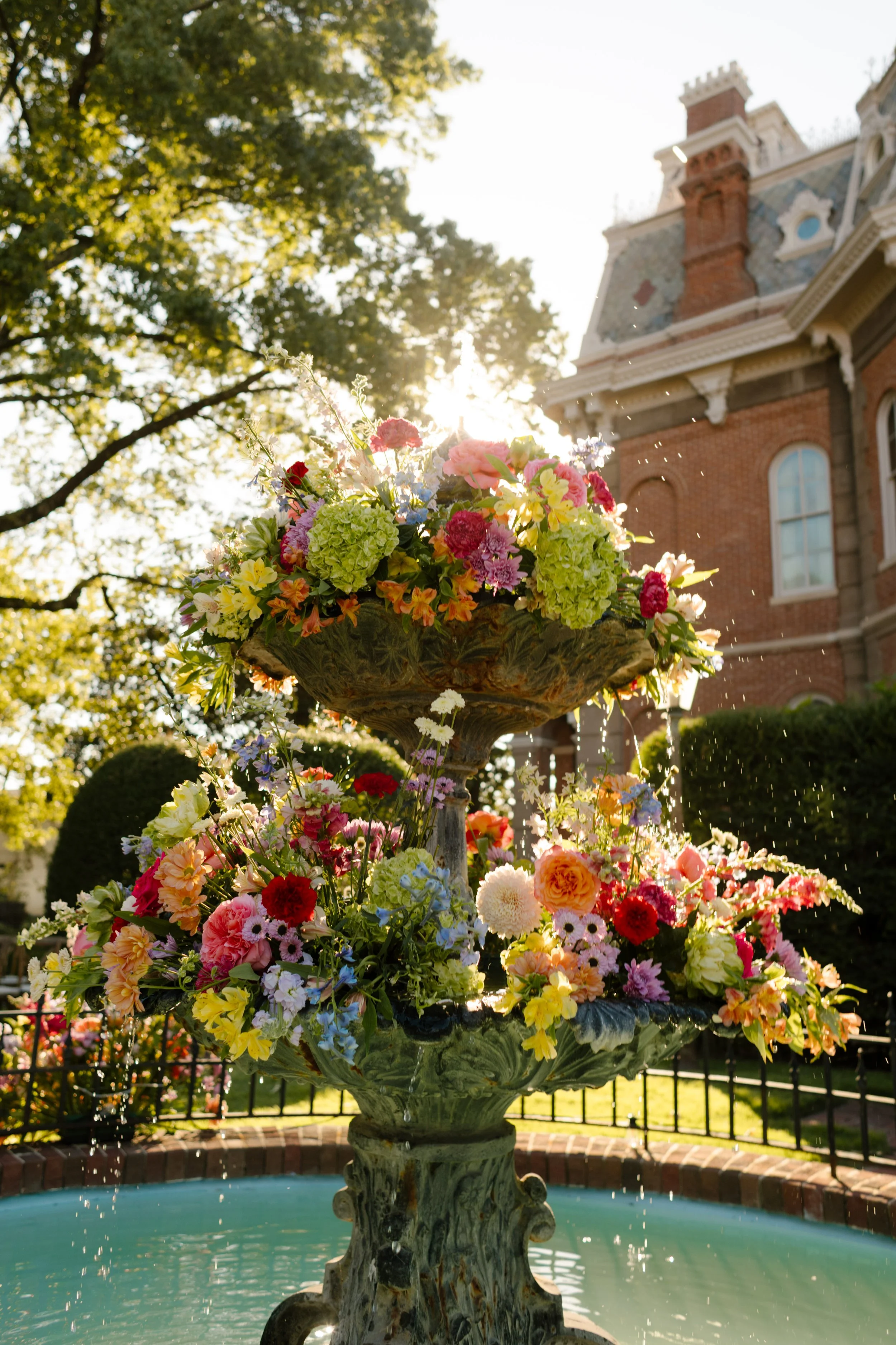 Floral fountain installation featuring abundant blooms inspired by 2027 wedding trends