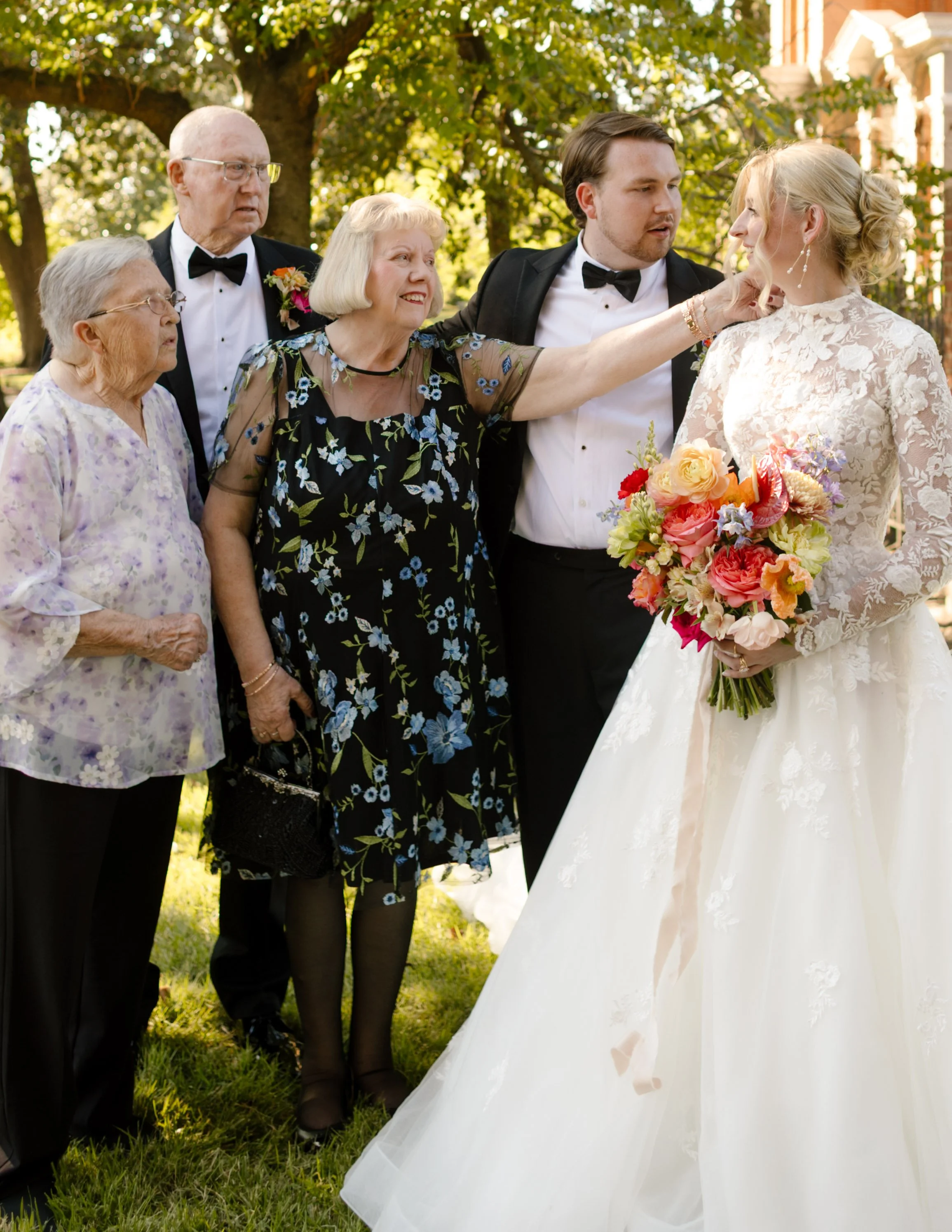 A heartfelt family moment as generations gather together to celebrate the bride on her wedding day
