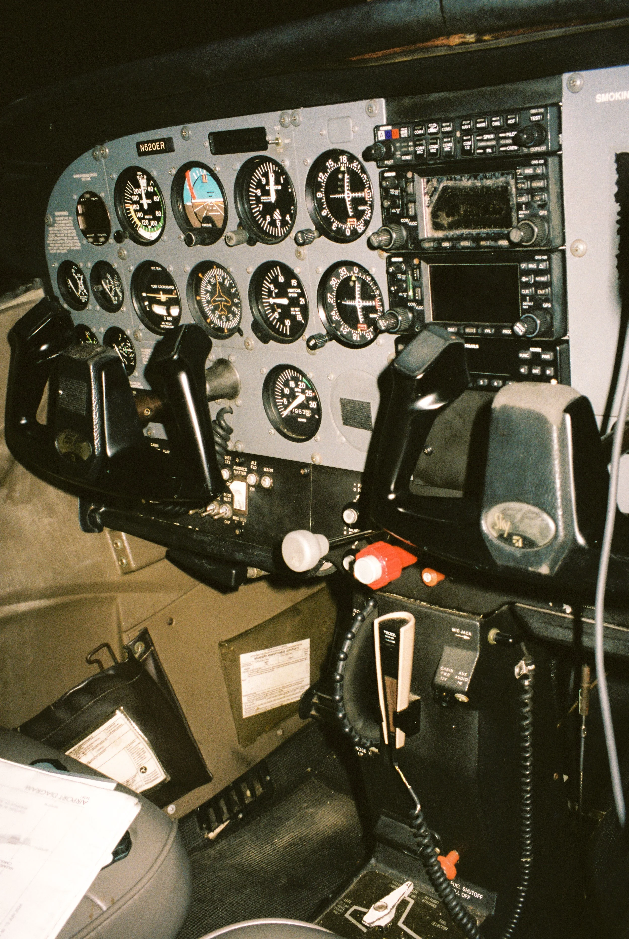 Close-up of a helicopter cockpit showcasing flight instruments and controls, photographed as part of the couple’s wedding-day adventure.